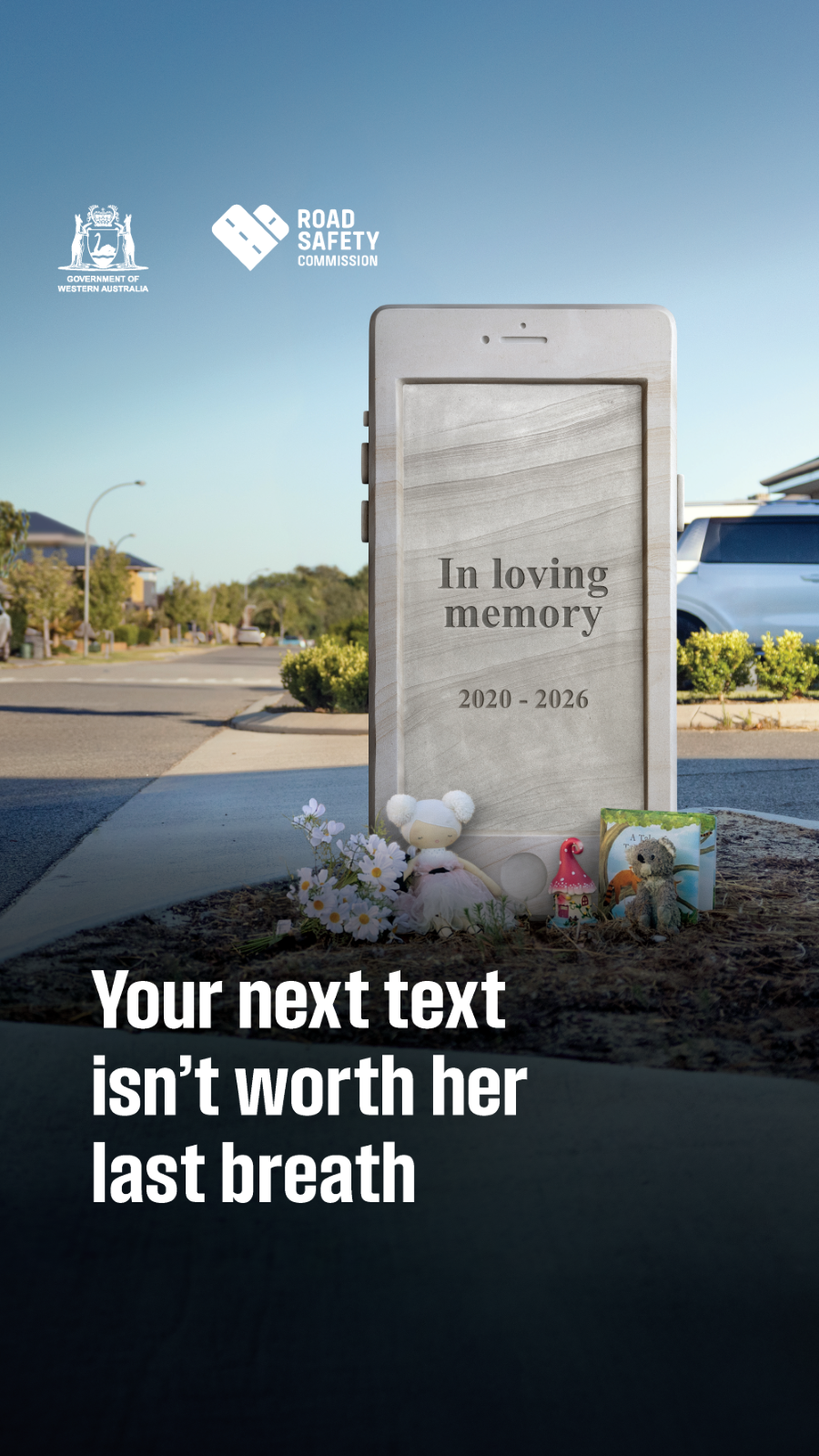 headstone phone on side of road with text, 'your next text isn't worth her last breath''