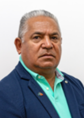 anthony is wearing a suit and looking at the camera