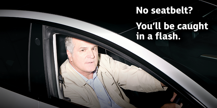 Text: 'Caught in a flash' safety camera campaign