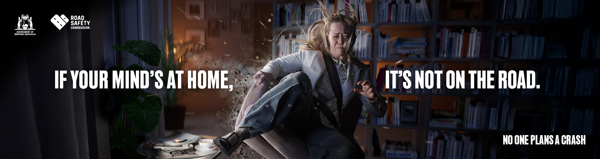 A woman looks like she is sitting in her living room but she's actually experiencing a crash. Text: If your mind's at home, it's not on the road.
