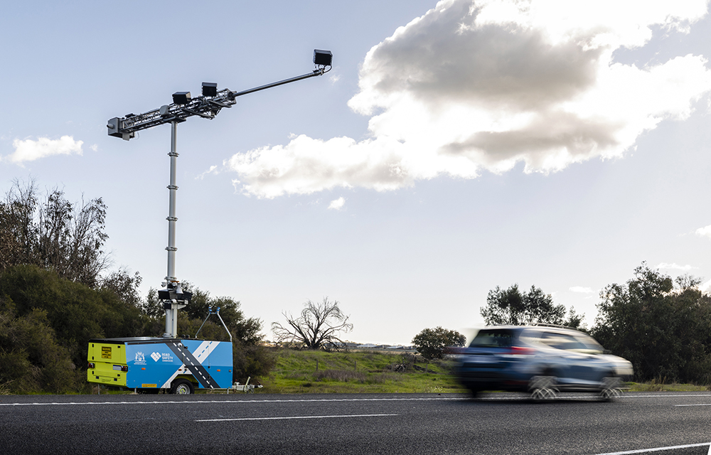 An example of a safety camera trailer parked at the side of a highway