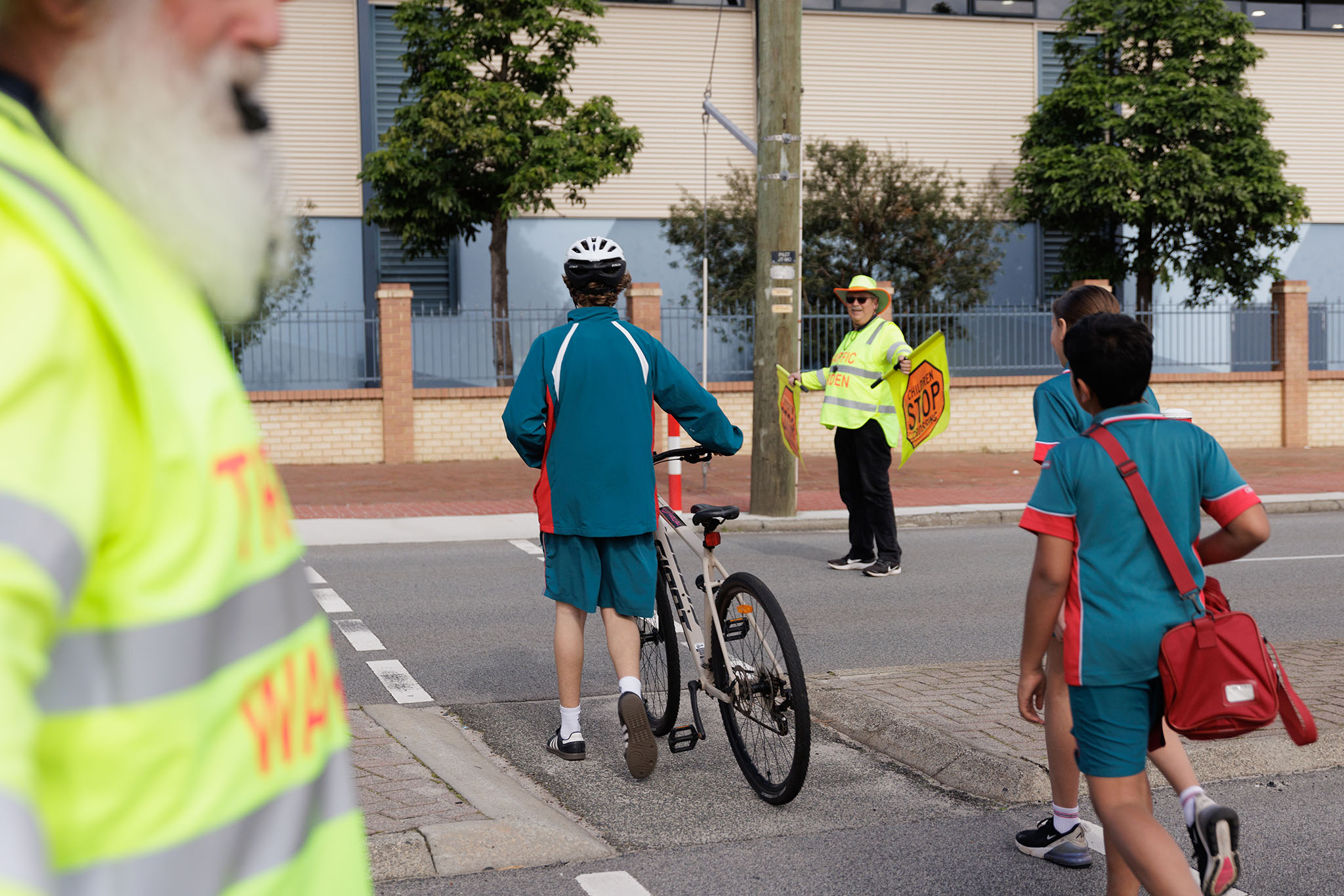Children walking across school crossing