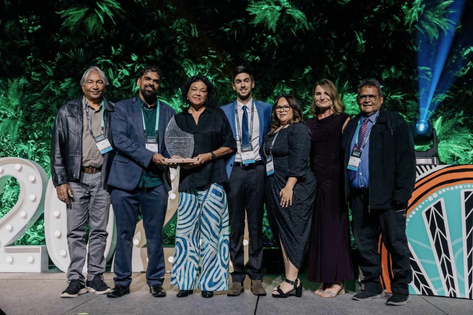 A group of people standing with their award for the 2026 Australian Institute of Aboriginal and Torres Strait Islander Studies (AIATSIS) Summit Awards for Excellence in Sustainability and Sustainable Futures