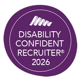 a circle-shaped logo which has a purple background colour and these words in the centre of the logo: Disability Confident Recruiter 2026
