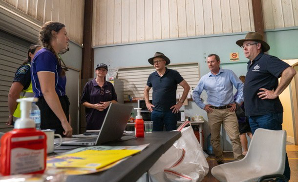 Three Department of Communities Emergency Relief Support works alongside Prime Minister Anthony Albanese and Premier Mark McGowan