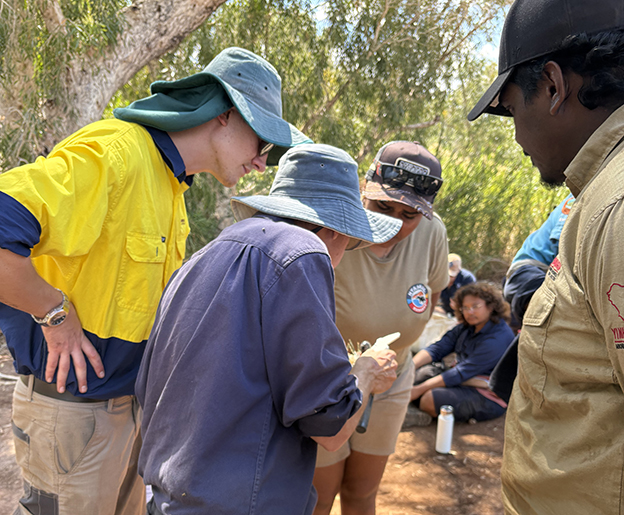1.	Senior Technical Officer Chris Bird showing rangers how to measure redclaw occipital carapace length.