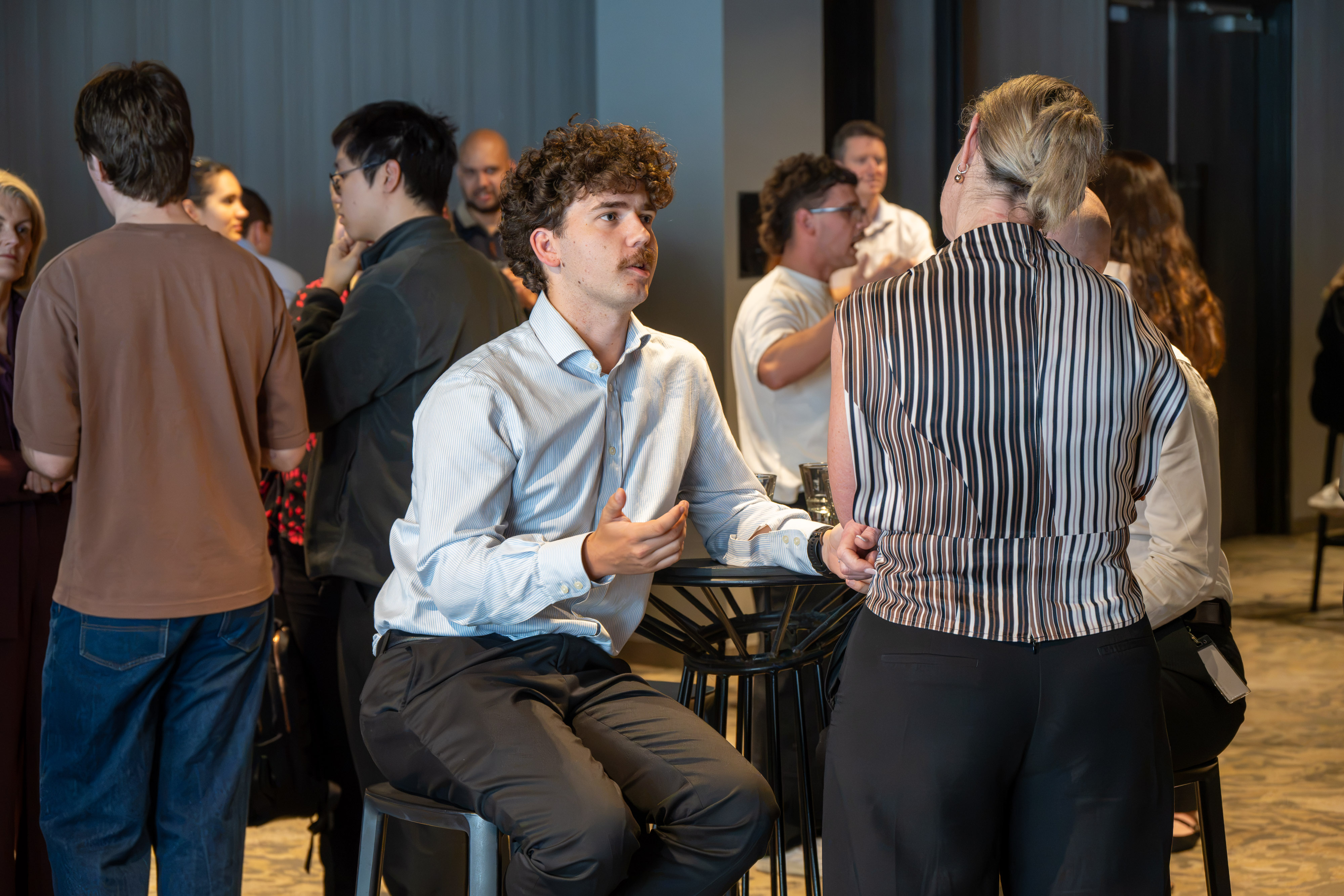 Photo of a Launch graduate networking.