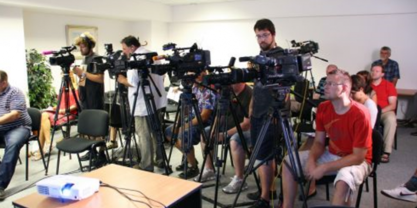 looking at a the media people, at a media conference