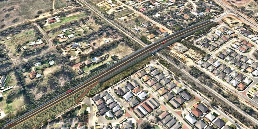Aerial shot of housing and rail