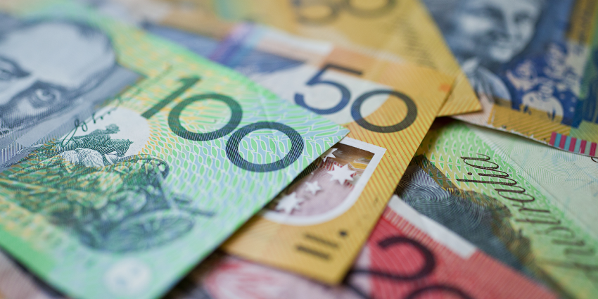 A pile of Australian currency with a shallow depth of field.