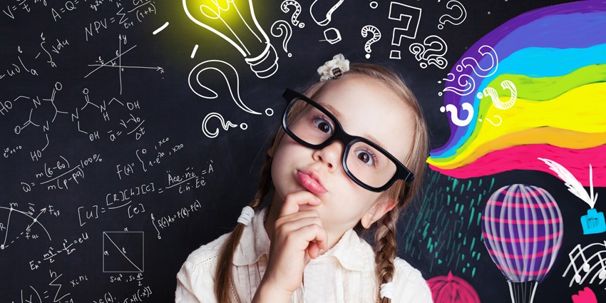 Decorative image of a little girl in glasses in front of a blackboard looking quizzical.