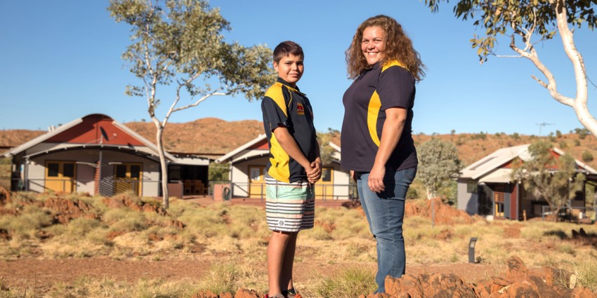 A young Aboriginal boy and his mother in a regional community.