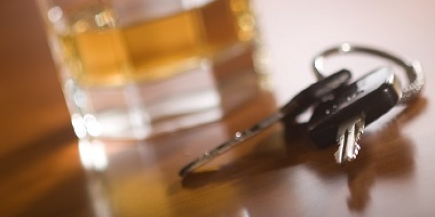 Glass of whiskey and car keys