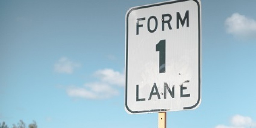 Form 1 Lane sign against a blue sky