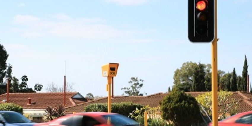 A red traffic light and camera