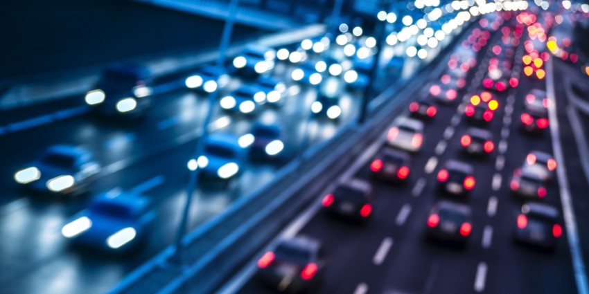 blurred cars on a major road