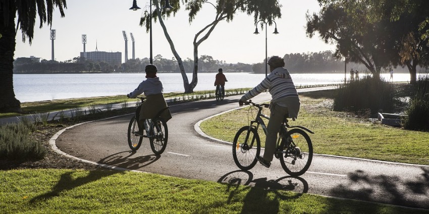 two cyclists on a path