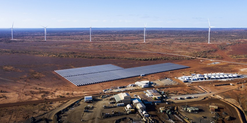 Agnew Mining Site with Renewable energy setup - drone shot of mine site with wind turbines and solar panels.