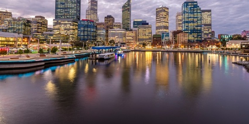 Perth city showing Elizabeth Quay and city buildings on a cloudy day