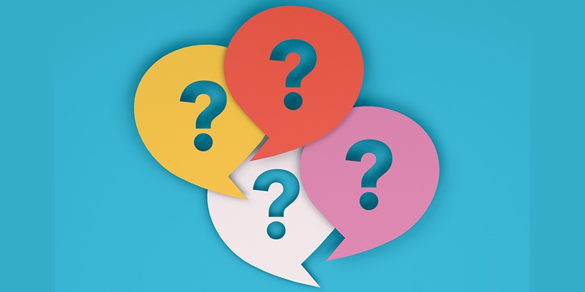 illustration of question marks in colourful speech bubbles