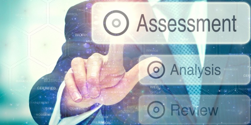 Man pressing Assessment Button