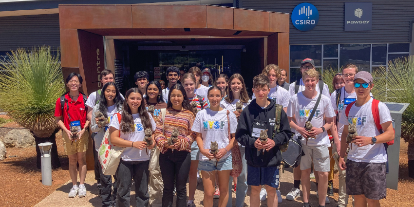 A group of Year 12 students standing outside the Pawsey Supercomputing Centre. They are visiting the centre as part of the National Youth Science Forum Year 12 program in 2023. 