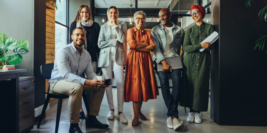 image of a group of people from various multicultural backgrounds and ages, all smiling