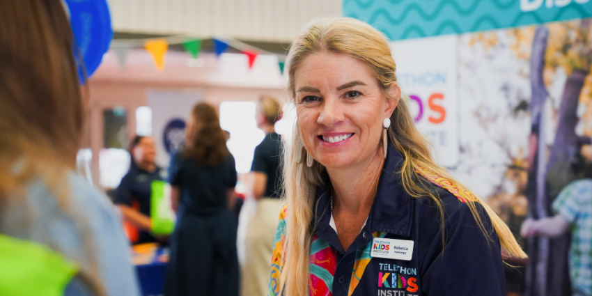 Portrait of Rebecca Famlonga wearing a Telethon Kids Institute shirt