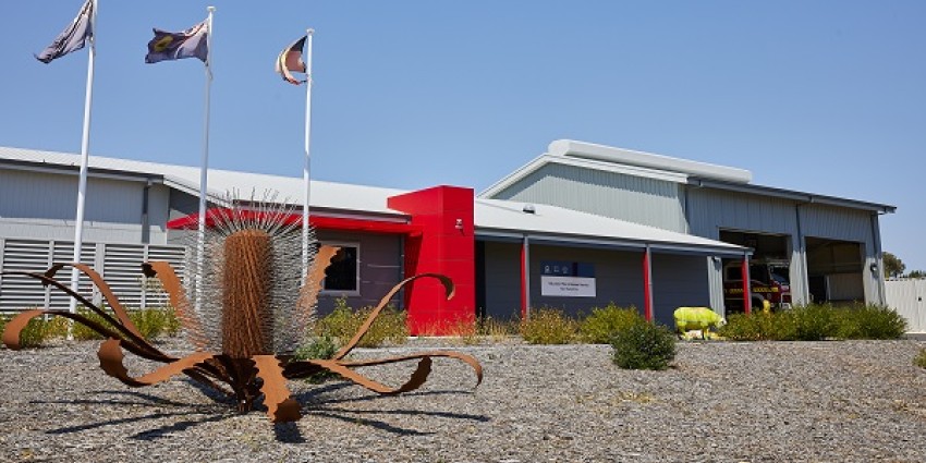 Northampton Volunteer Fire Rescue Service building. A sculpture of a banksia flower is in front of the building.