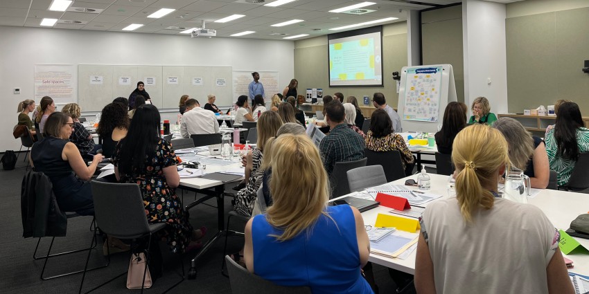 Group of attendees at an Interagency meeting in 2024