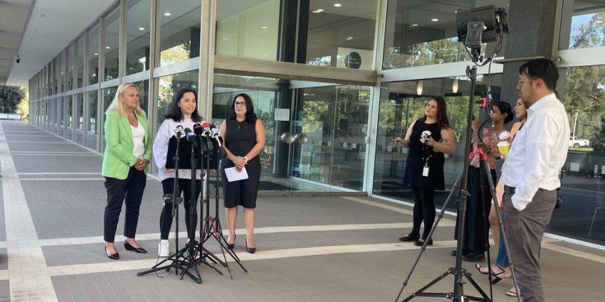photo of a press conference featuring Minister Sabine Winton