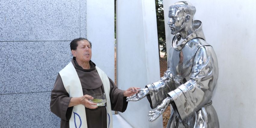 Father Marcellinus blessing St Anthony in All Saints Mausoleum
