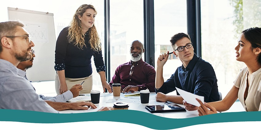 diverse group of people in workplace office having a discussion