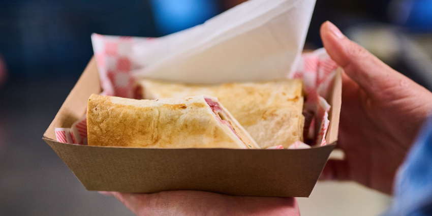 A close up of takeaway food in a cardboard container