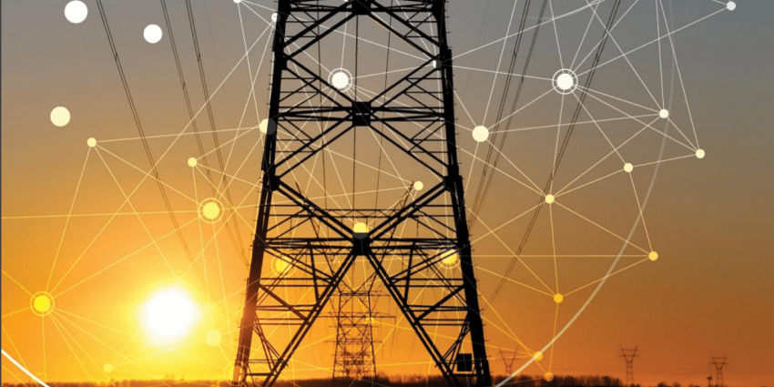 A pylon with sun setting in the background