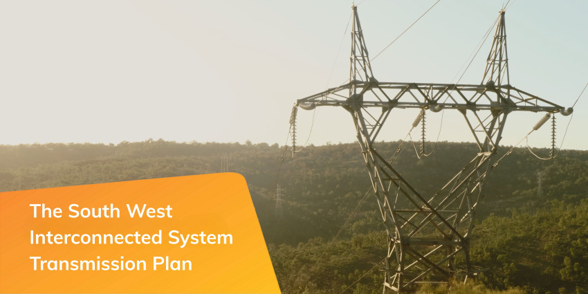 Transmission tower looking over a valley.