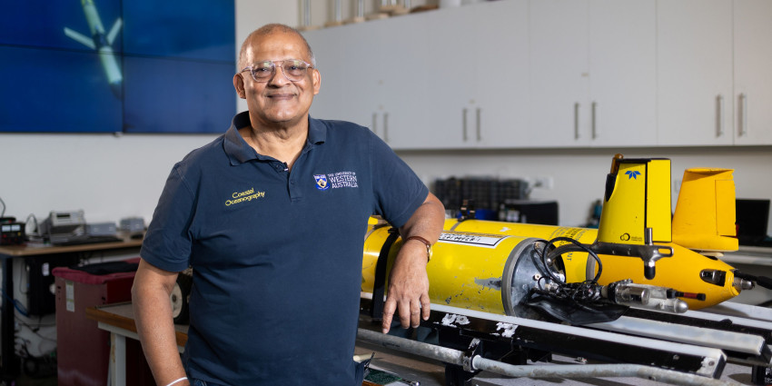Charitha standing inside his lab
