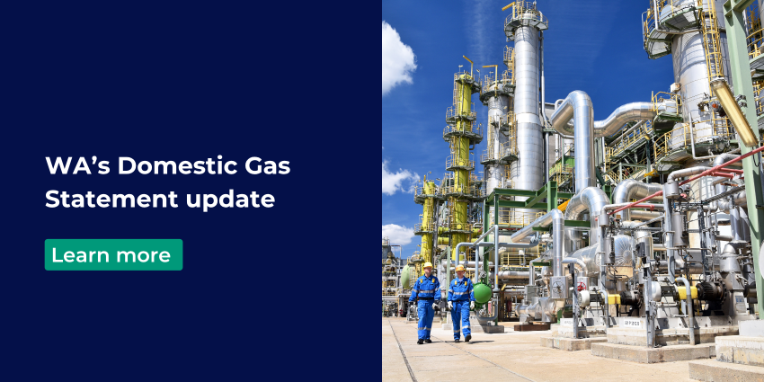 Image of workers walking by facility