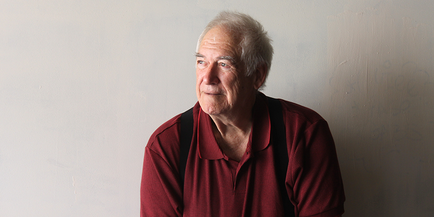 Photo of Ian Molyneax in red shirt