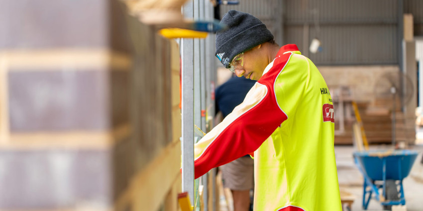 male apprentice working at a workshop