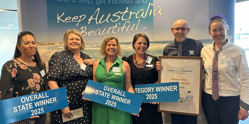 Group photo of the Williams community members accepting their award.