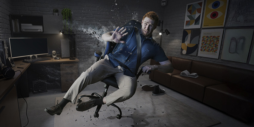 A man appears to be in his gamer den but is actually experiencing a serious road crash