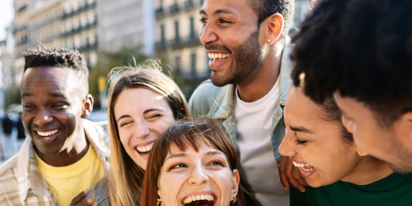 Group of students smiling and laughing 