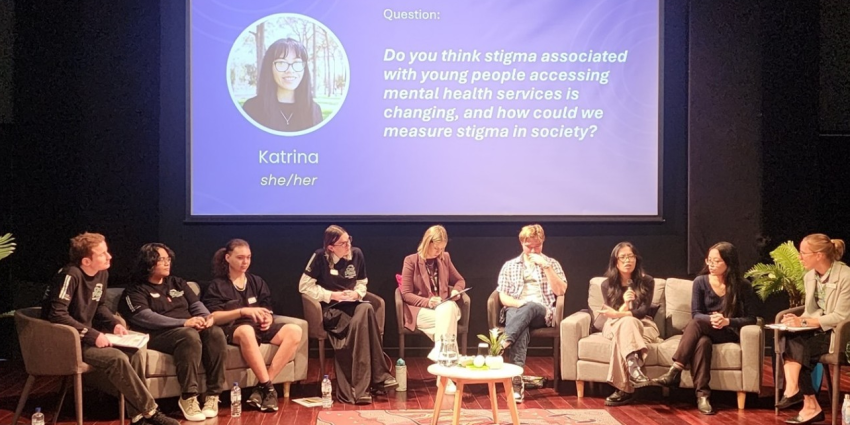 A group of young Western Australians on stage with, engaging in a forum open discussion session with the audience at the Midland Youth Panel Discussion event