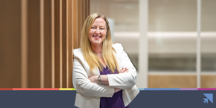 Photo of Eve Tweedie looking at the camera and smiling.