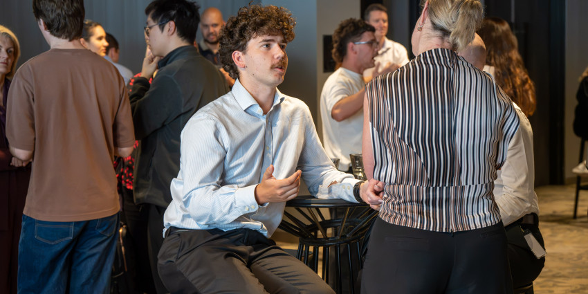 Photo of a Launch graduate networking.