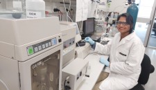 Manaswini Natarajan, an APR Intern PhD student, smiles while working in her lab
