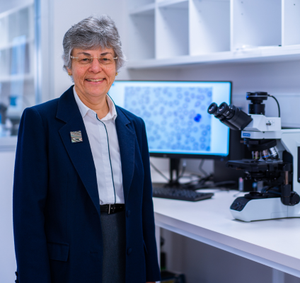 A portrait of Professor Wendy Erber in a lab